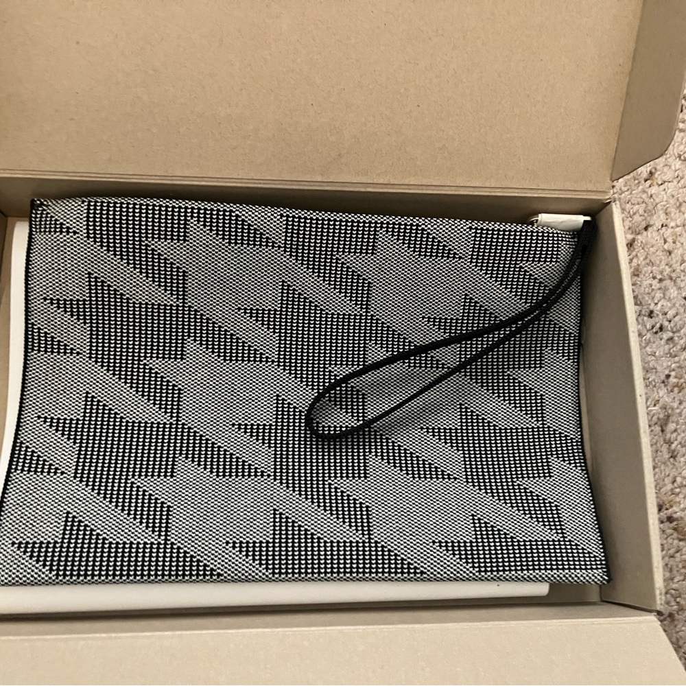 Rothy's Black and White Clutch